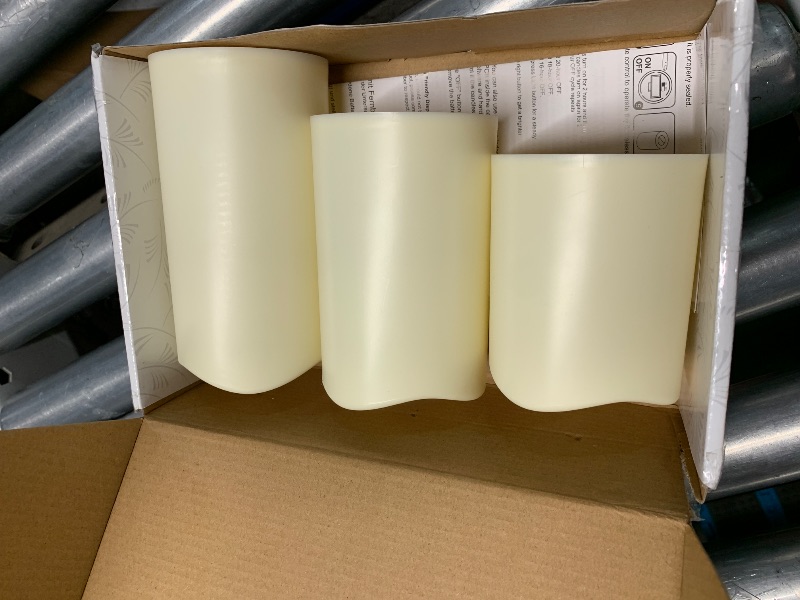 Photo 1 of ***(HEAVILY USED/ MISSING REMOTE)***7LinRay Flameless Flickering Candles with Remote and Timers, 1000 Hours Waterproof Outdoor Indoor Battery Operated LED Pillar Candles, Ivory Plastic, Set of 3(D 3" x H 4" 5" 6")