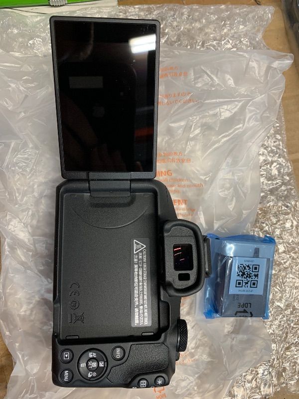 View 5 of *missing 2 lens and a battery* see photos for contents* Canon EOS R50 Mirrorless Camera with RF 24-50mm f/4.5-6.3 IS STM And EF 75-300mm f/4-5.6 III & 420-800mm f/8 Lens + Mount Adapter + 128 GB Memory + Extra Battery + More (28pc Bundle)