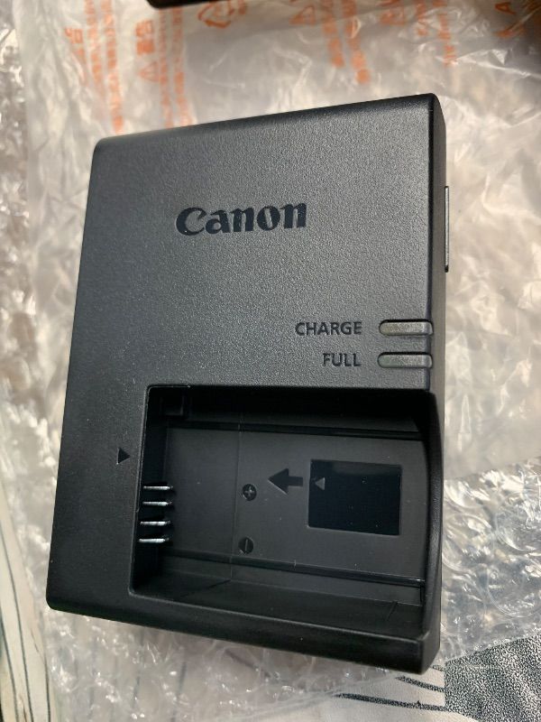 View 14 of *missing 2 lens and a battery* see photos for contents* Canon EOS R50 Mirrorless Camera with RF 24-50mm f/4.5-6.3 IS STM And EF 75-300mm f/4-5.6 III & 420-800mm f/8 Lens + Mount Adapter + 128 GB Memory + Extra Battery + More (28pc Bundle)