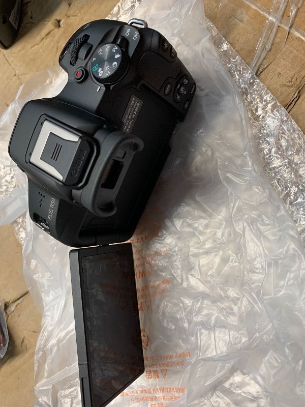 View 9 of *missing 2 lens and a battery* see photos for contents* Canon EOS R50 Mirrorless Camera with RF 24-50mm f/4.5-6.3 IS STM And EF 75-300mm f/4-5.6 III & 420-800mm f/8 Lens + Mount Adapter + 128 GB Memory + Extra Battery + More (28pc Bundle)