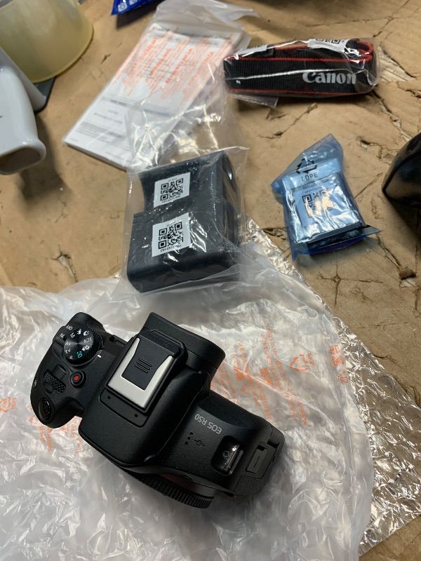 View 15 of *missing 2 lens and a battery* see photos for contents* Canon EOS R50 Mirrorless Camera with RF 24-50mm f/4.5-6.3 IS STM And EF 75-300mm f/4-5.6 III & 420-800mm f/8 Lens + Mount Adapter + 128 GB Memory + Extra Battery + More (28pc Bundle)
