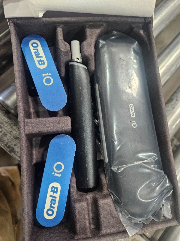 Photo 1 of **aFactory sealed**Oral-B iO Deep Clean + Protect Rechargeable Electric Toothbrush, Black, iO Series 7, 2 Replacement Brush Heads, Charging Travel Case