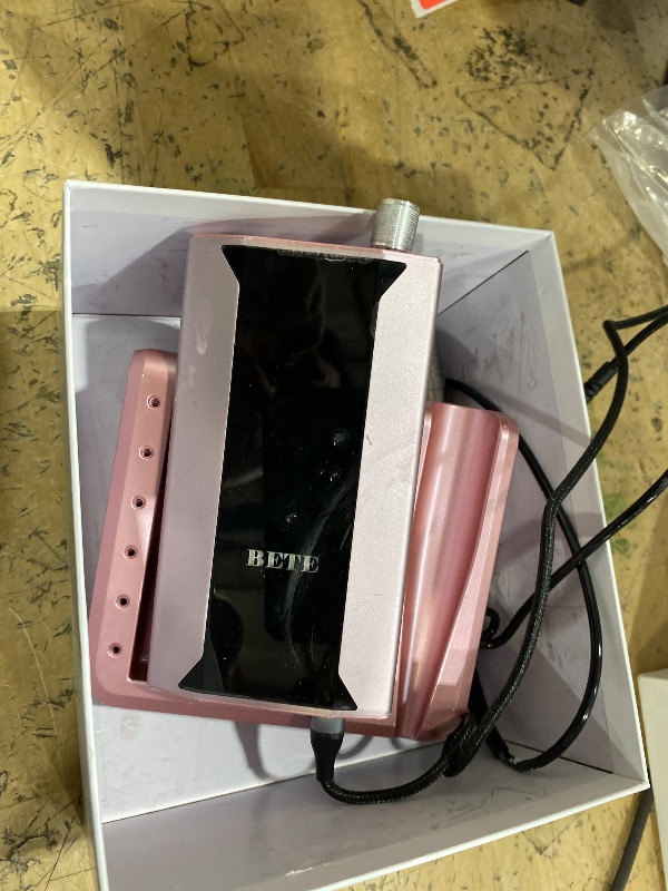 Photo 1 of ** NEED CHARGED / NOT TURNING ON**

BETE Professional Nail Drill Machine, 0-40000RPM Brushless Durable Electric Nail File for Acrylic Gel Nails, Rechargeable Nail Drill with Charging Base with 6pcs Drill Bits for Salon Home, Pink