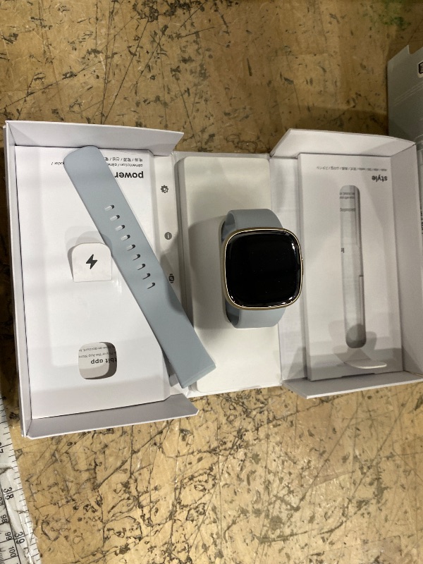 Photo 1 of **need charged** ** charged cable not included**

Fitbit Sense 2 Advanced Health and Fitness Smartwatch with Tools to Manage Stress and Sleep, ECG App, SpO2, 24/7 Heart Rate and GPS, Blue Mist/Pale Gold, One Size (S & L Bands Included)