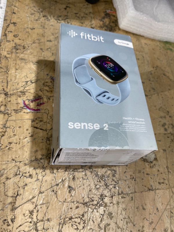 Photo 1 of **need charged** ** charged cable not included**

Fitbit Sense 2 Advanced Health and Fitness Smartwatch with Tools to Manage Stress and Sleep, ECG App, SpO2, 24/7 Heart Rate and GPS, Blue Mist/Pale Gold, One Size (S & L Bands Included)