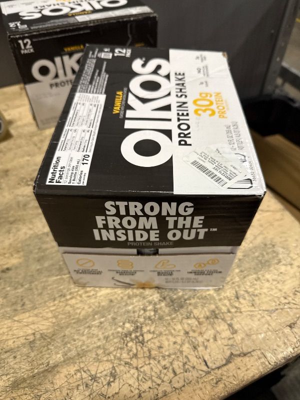 View 2 of 11/26 Oikos Protein Shake, Vanilla, 30g High Protein Drinks, Shelf Stable, Ready to Drink, 5g Prebiotic Fiber, 12 fl oz Bottle, 12 Count?