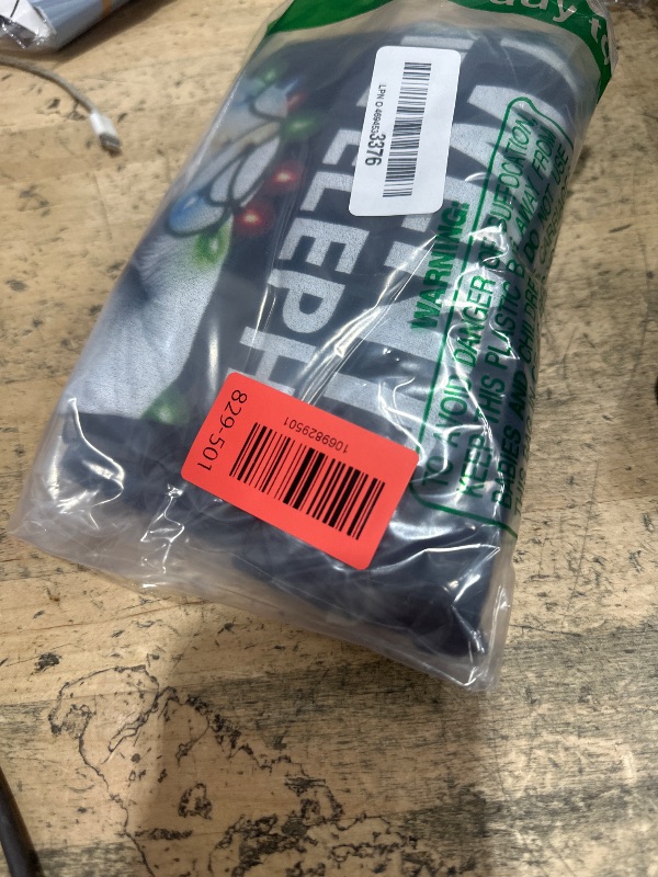 Photo 1 of ***Black not purple ***Funny White Elephant Gift Wrapped Elephant Dumb Gift T-Shirt XL