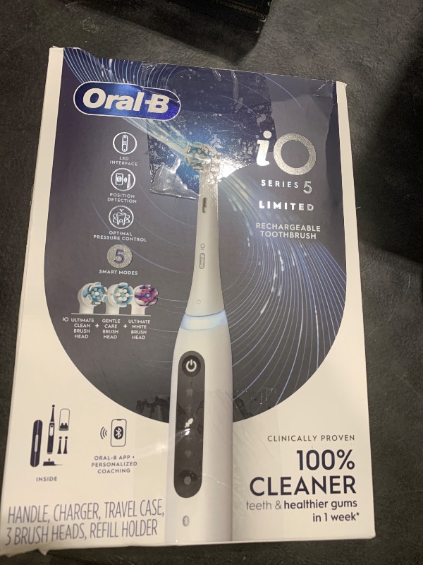 Photo 1 of Oral-B iO Deep Clean + Whiten Rechargeable Electric Toothbrush with Visible Pressure Sensor, 2 Minute Timer, 5 Cleaning Settings, 1 iO5 Limited, 3 Toothbrush Heads, Travel Case & Refill Holder, White