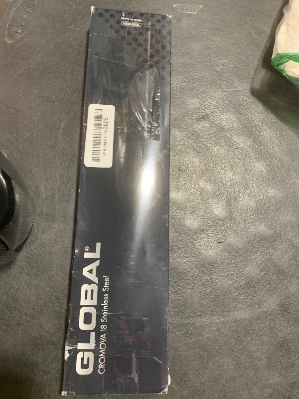 Photo 1 of **USED, CHIPPED** Global 7 Inch Vegetable Knife - Lightweight Japanese Stainless Steel, Razor-Sharp Edge, Made in Japan, G-45