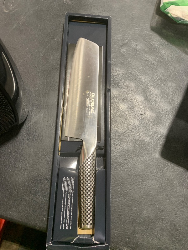 Photo 1 of **USED, CHIPPED** Global 7 Inch Vegetable Knife - Lightweight Japanese Stainless Steel, Razor-Sharp Edge, Made in Japan, G-45