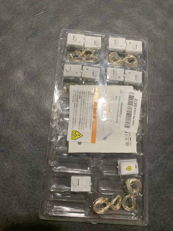 Photo 1 of  ONLY 12 INCLUDED- 20 Pack LED Fairy Lights Battery Operated,3 Features Blinking Slowly Blinking & just on 7FT 20 LED Waterproof Mini Twinkle String Lights for Wedding Mason Jars Party Christmas Decorations(Warm White)