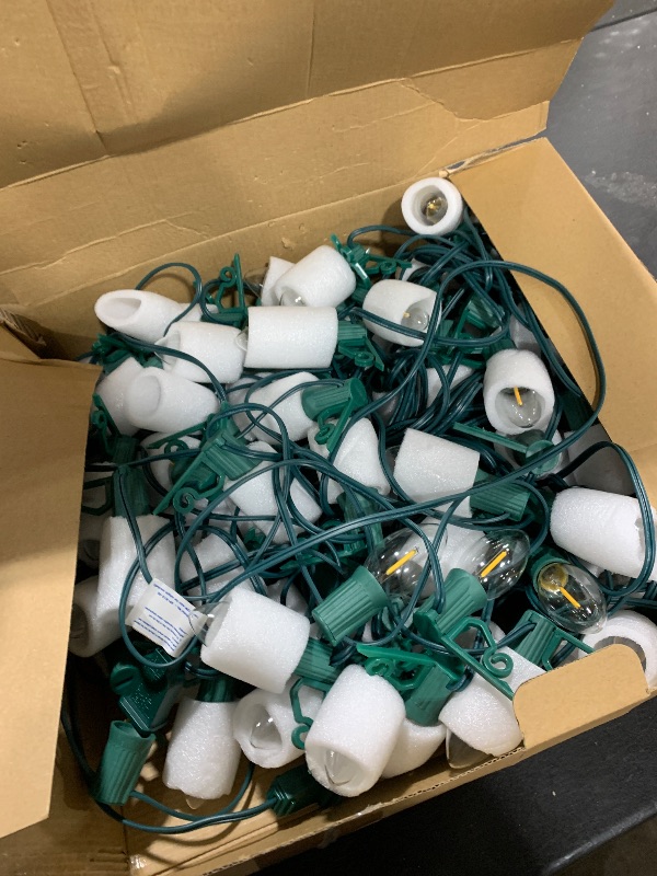 Photo 1 of 100FT C9 LED Christmas Lights Outdoor with Clips, Large Bulb Christmas String Lights with Christmas Light Clips, Warm White Christmas Roofline Lights for House and Garden Xmas Outdoor Decoration