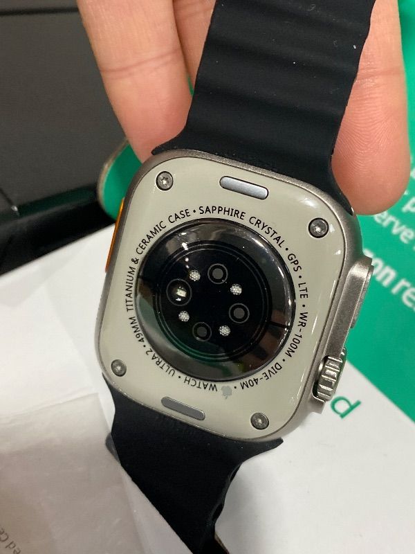 Photo 1 of Apple Watch Ultra [GPS + Cellular 49mm] Titanium Case with Midnight Ocean Band, One Size (Renewed Premium)