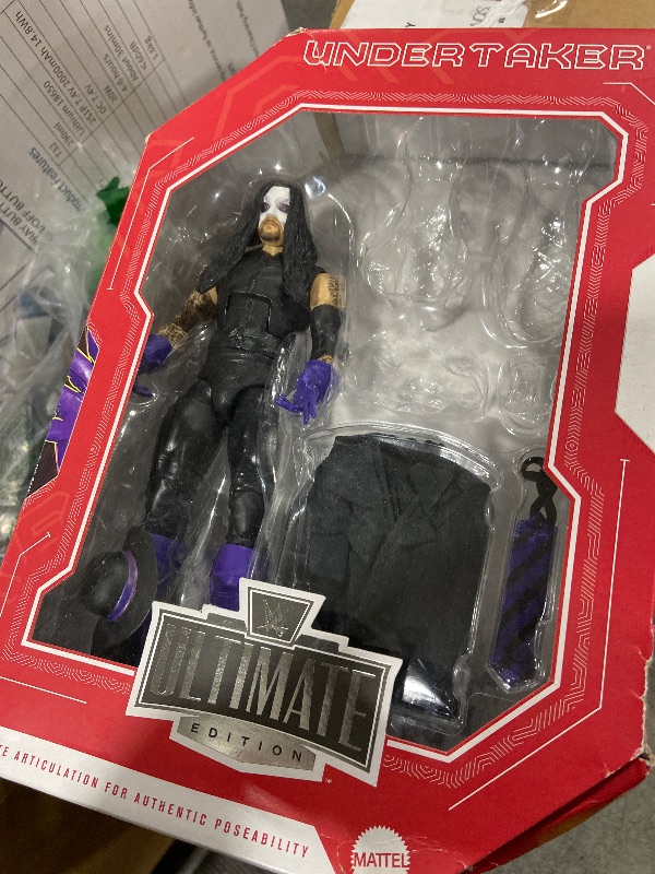 Photo 1 of ?Mattel WWE Legends Ultimate Edition Action Figure & Accessories Set, Undertaker 6-inch Collectible with Swappable Heads & Hands