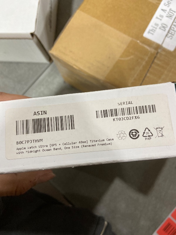 Photo 1 of Apple Watch Ultra [GPS + Cellular 49mm] Titanium Case with Midnight Ocean Band, One Size (Renewed Premium)