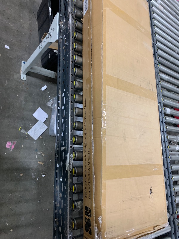 Photo 1 of SHW 55 x 28 Inches Electric Height Adjustable Standing Desk with Drawer and Memory Preset, Maple