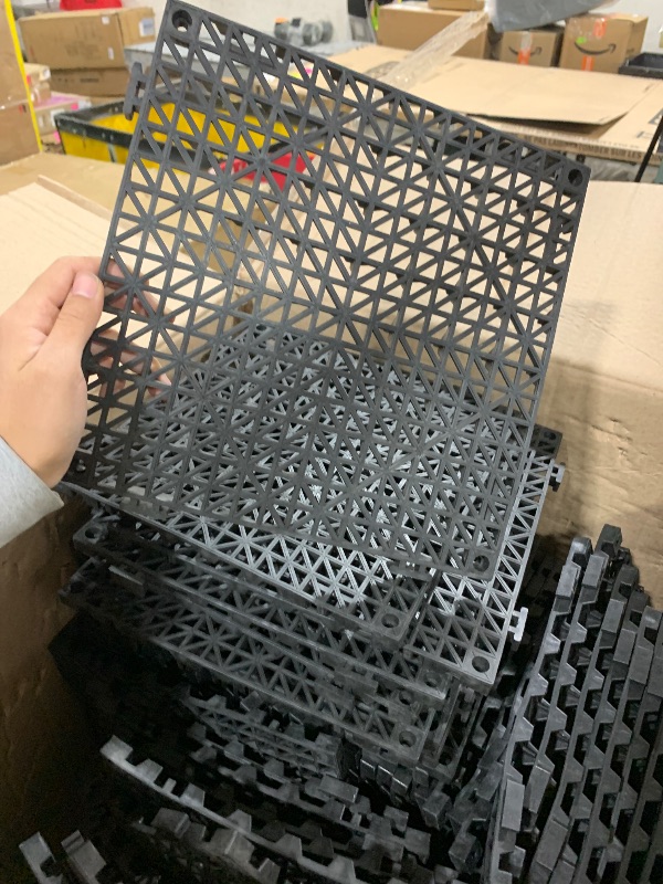 Photo 1 of interlocking Drainage Mat, 12” x 12” Modular Interlocking Cushion, Splicing Drainage Mats, Non-Slip Black PP Drainage Floor Tile and Shower Mat, for Garage, Garden, Kitchen & Outdoor