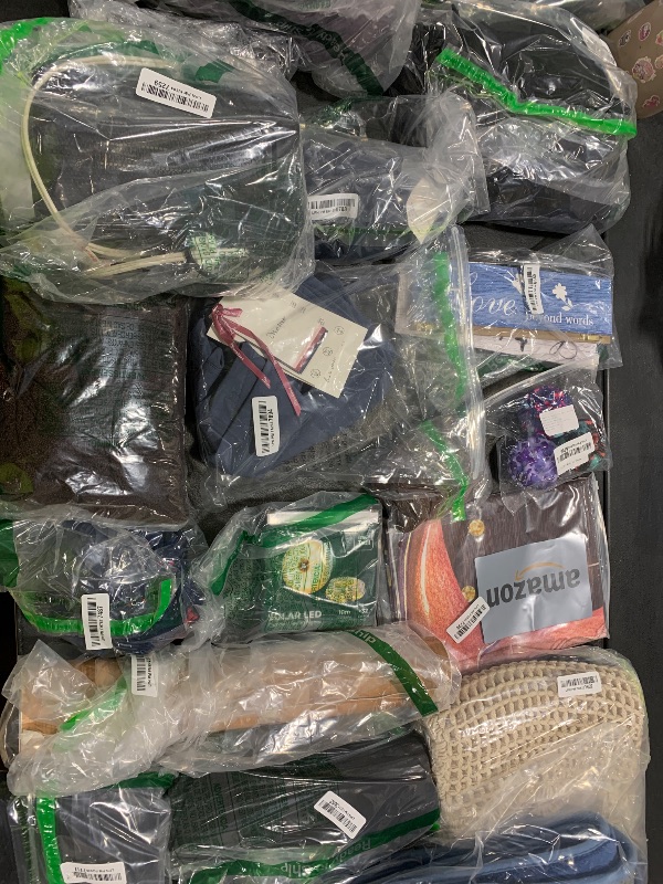 Photo 1 of BOX LOT FULL OF MISCELLANEOUS ITEMS CLOTHING, HOME ESSENTIALS, DECORATIONS AND OTHER RANDOM ITEMS