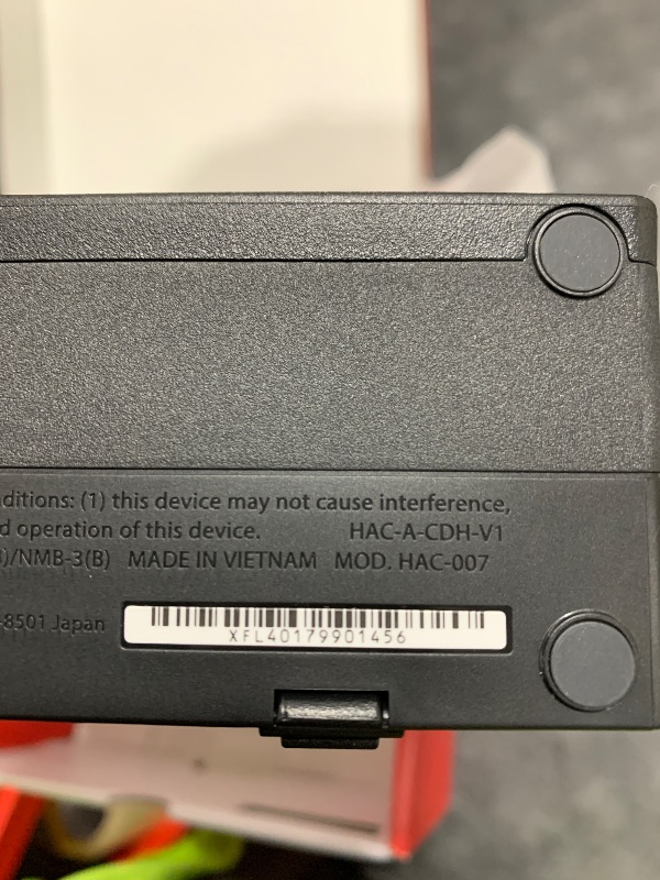 Photo 1 of ITEM NON FUNCTIONAL ---------------------------- PARTS ONLY ---------------------------------------------------------------------------Nintendo Switch™ with Neon Blue and Neon Red Joy?Con™