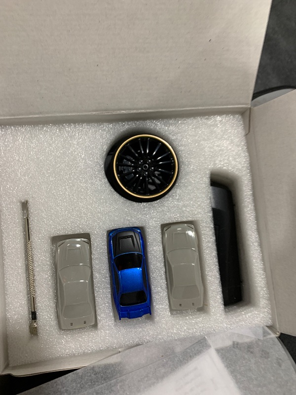 Photo 1 of FLYCOLOR Turbo Racing 1:76 Scale Drift RC Car with Gyro Mini Full Proportional RTR 2.4GHZ Remote Control with 2 Replaceable Body Shell (C64-BLUE)