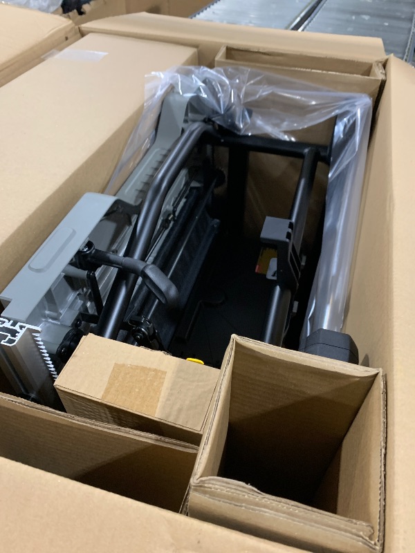 Photo 1 of DEWALT Table Saw 10 Inch with Foldable Rolling Table Saw Stand, 15 Amp, 4800 RPM, 32-1/2-Inch Rip Capacity (DWE7491RS)