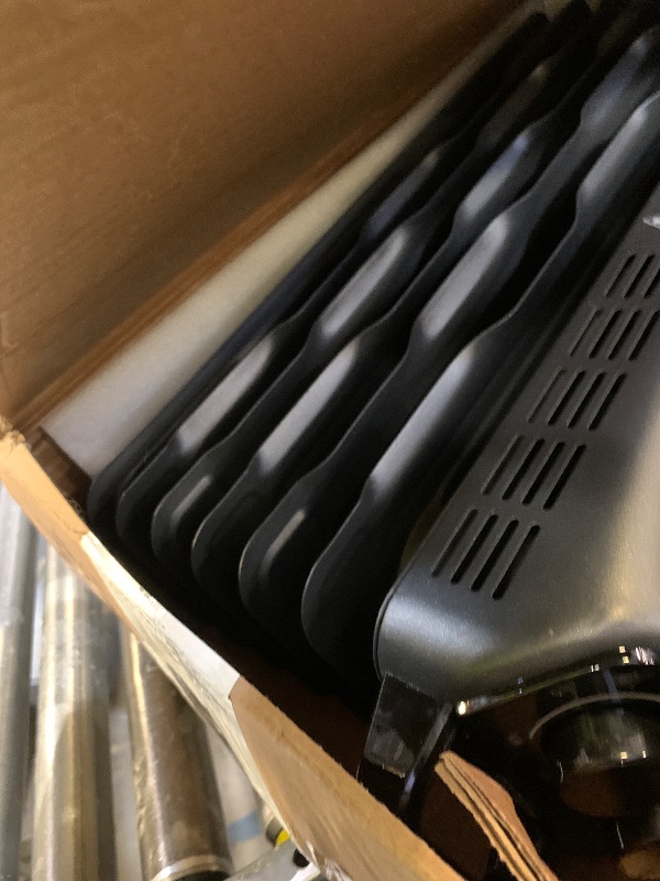 Photo 1 of Amazon Basics Oil Space Heater, Portable Radiator Heater with 7 Oil-Filled Fins for Indoor Use, 3 Heat Settings, Thermostat, Tip-Over Protection, ETL Safety Certificate, Manual Control, 1500W, Black