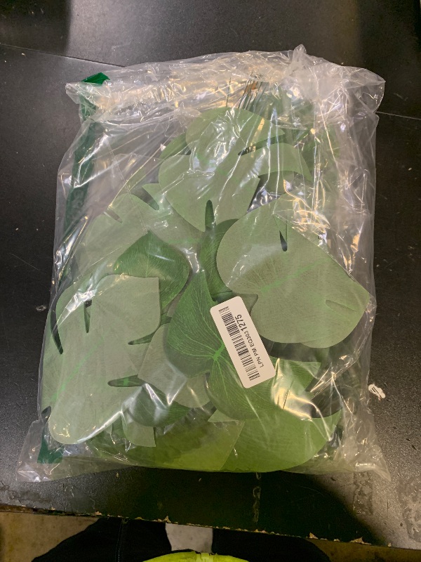 Photo 1 of 112Pieces 7 Kinds Artificial Palm Leaves Tropical Leaves with Stems Jungle Leaves Decorations for Hawaiian Luau Party Beach Baby Shower Wedding Birthday