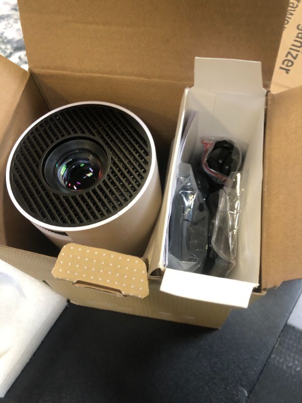 Photo 1 of Mini Projector with WiFi and Bluetooth Built-in Apps Smart Projector Support 4K 1080P FHD 180° Adjustable Auto Keystone Compatibile with HDMI/TV Stick/Memory Stick/Laptop, White