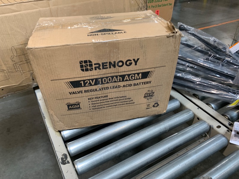Photo 1 of **MAJOR DAMAGE & Untested**
Renogy Deep Cycle AGM 12 Volt 100Ah Battery, 3% Self-Discharge Rate, 1100A Max Discharge Current, Safe Charge Appliances for RV, Camping, Cabin, Marine and Off-Grid System, Maintenance-Free