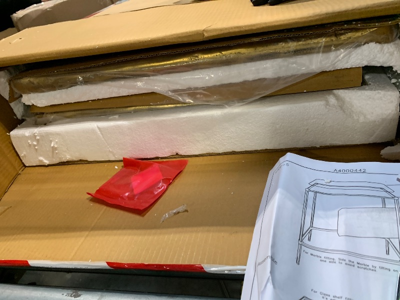 Photo 1 of ***FINAL SALE/NO RETURN, VIEW NOTES*** Signature Design by Ashley Ryandale | Contemporary Accent Table – Glass Top, Aluminum Frame & Marble Shelf, Antique Brass Finish