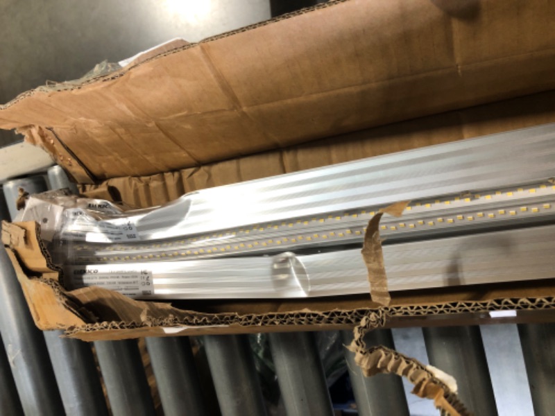 Photo 1 of *****MAJOR COSMETIC DAMAGE**** ELEKICO 6 Pack 100w 8ft Led Shop Light, Super Bright 15000lm 5000k V Shape 8' Led Shop Lights, Linkable 8 Foot Led Shop Lights for Garage Warehouse, Supermarket, Basement, Barn, Storage Area