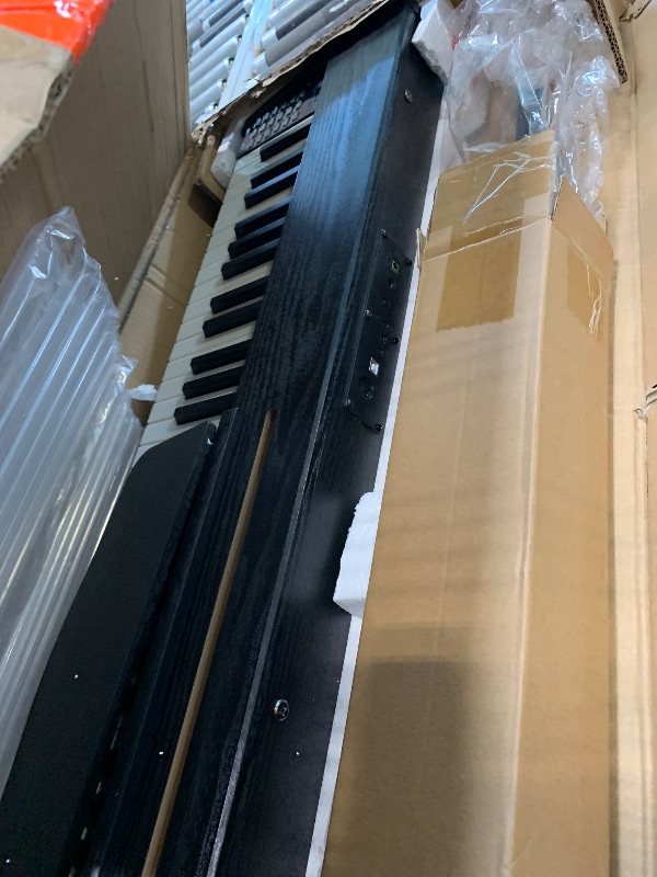 Photo 1 of ** NO RETURNS** FINAL SALE** 88 Key Digital Piano Keyboard,88 Key Full Size Weighted Hammer Action Electric Keyboard Piano with 200 Rhythms,200 Tones, Piano Keyboard with Stand, TriplePedal,Headphone, Carrying Bag
