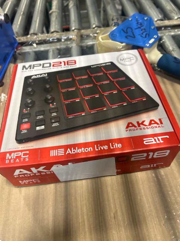 Photo 1 of ** SOLD AS IS, NO REFUND/RETURN** SEE COMMENTS
Akai Professional MPD218 - USB MIDI Controller with 16 MPC Drum Pads, 6 Assignable Knobs, Note Repeat and Full Level Buttons and Production Software