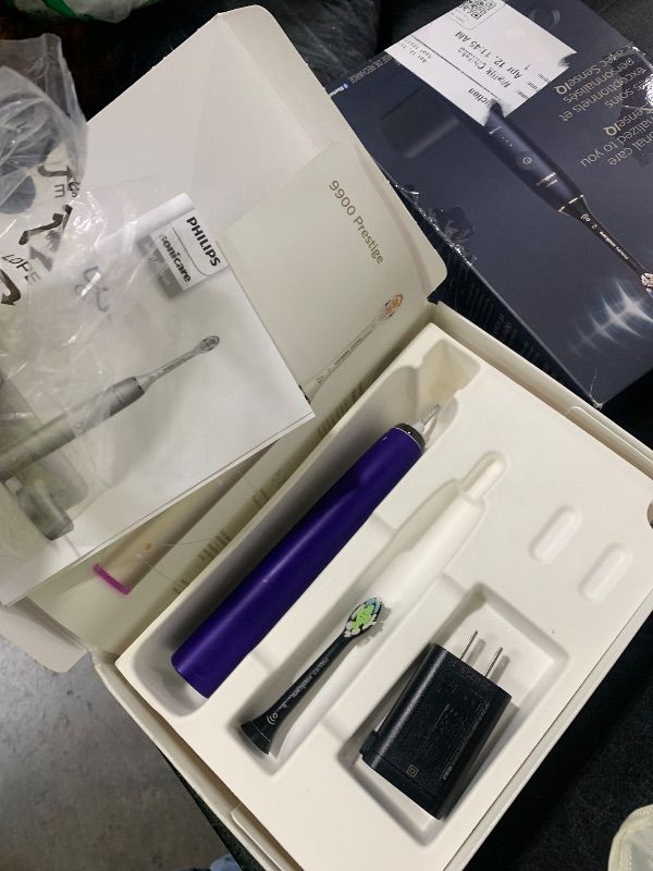 Photo 1 of Philips Sonicare DiamondClean Prestige 9900 Rechargeable Electric Toothbrush with SenseIQ, 5 Premium All-in-One Brush Heads, Plaque Removal, Gum Care, Whitening, Midnight, BD9002AZ