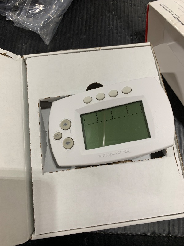 Photo 1 of Honeywell Home RTH6580WF Wi-Fi 7-Day Programmable Thermostat, White