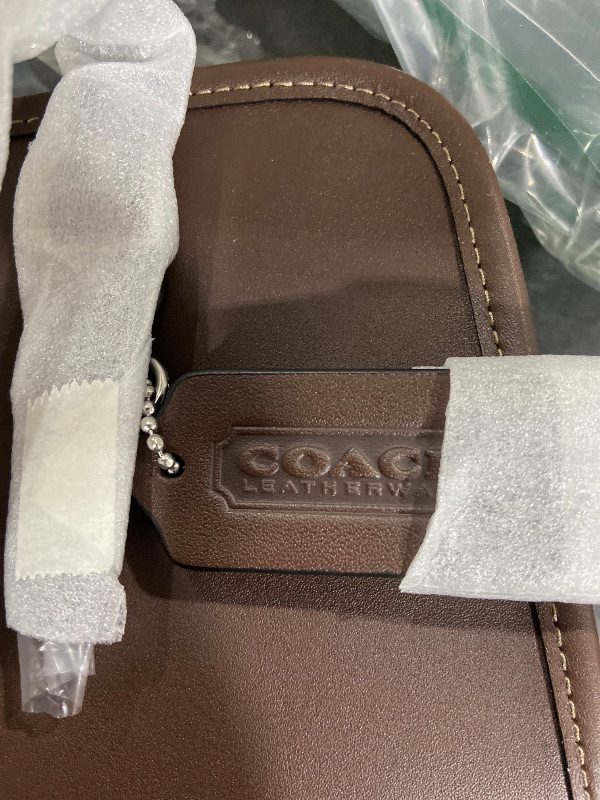 Photo 1 of COACH Women's Swing Zip Bag, LH/Maple, One Size