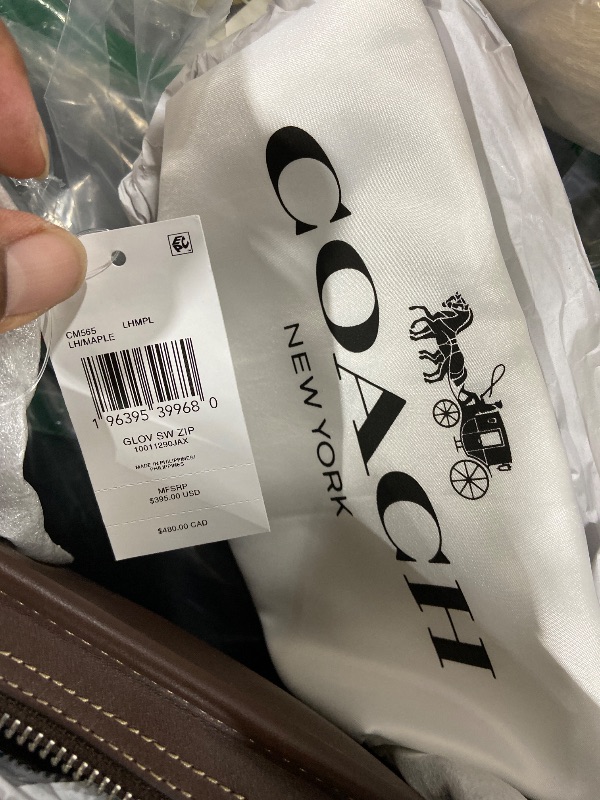 Photo 1 of COACH Women's Swing Zip Bag, LH/Maple, One Size