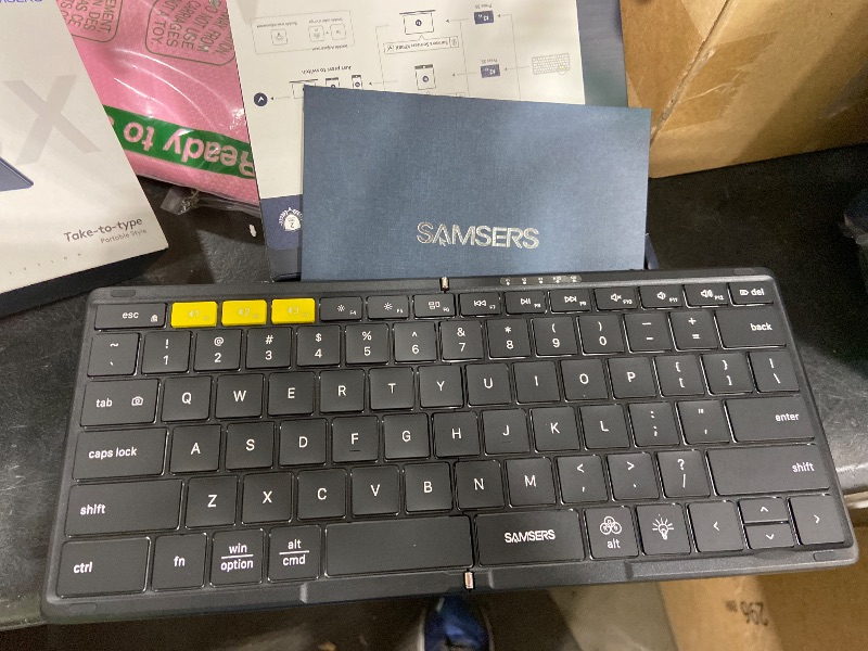 Photo 1 of Samsers Full-Size Foldable Bluetooth Keyboard, KF08X Wireless Folding Keyboard with Backlight, Portable Travel Keyboards for iPhone iPad Smartphone Tablet Laptop, Android Windows Mac OS - Black
