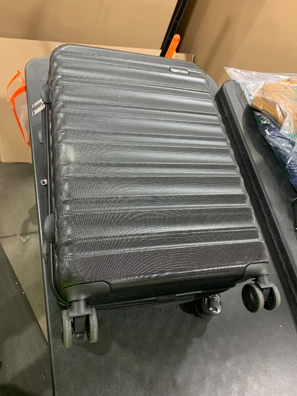 Photo 1 of Amazon Basics 26" Hardside Medium Checked Luggage, Expandable For Up to 15% More Space, With Scratch-Resistant Surface, Four Multi-directional Wheels, Black