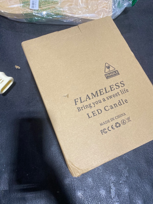 Photo 1 of kakoya 11" x 4" Large Outdoor Waterproof Flameless LED Candles with Remote and Timer,Acrylic Pillar Candles Battery Operated with Embedded Star String for Porch,Patio,Outdoor Decor,Set of 2(Red)