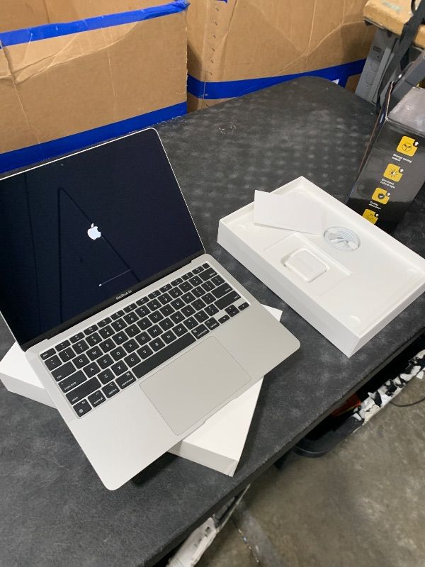 Photo 1 of 2020 Apple MacBook Air Laptop: Apple M1 Chip, 13” Retina Display, 8GB RAM, 256GB SSD Storage, Backlit Keyboard, FaceTime HD Camera, Touch ID. Works with iPhone/iPad; Silver