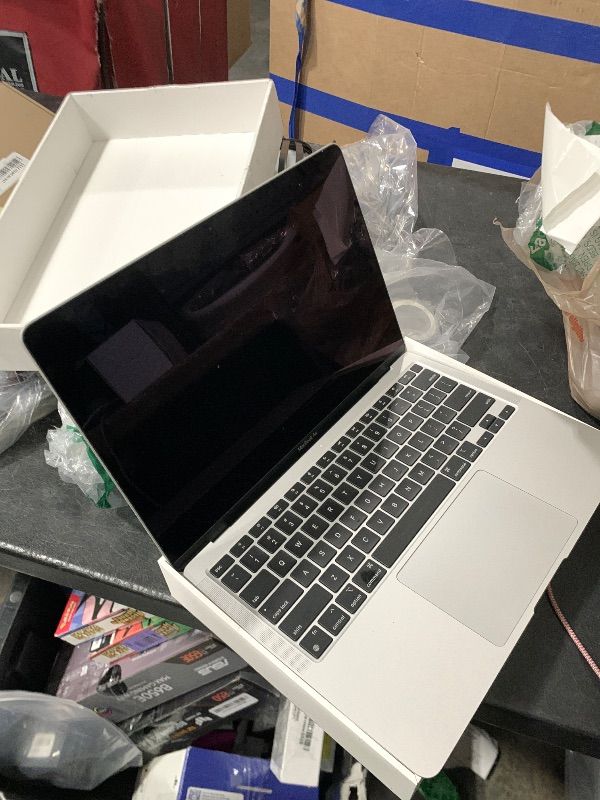 Photo 1 of LOCKED TO PREVIOUS OWNER****SELLING FOR PARTS ONLY-----------------------------*2020 Apple MacBook Air Laptop: Apple M1 Chip, 13” Retina Display, 8GB RAM, 256GB SSD Storage, Backlit Keyboard, FaceTime HD Camera, Touch ID. Works with iPhone/iPad; Silver