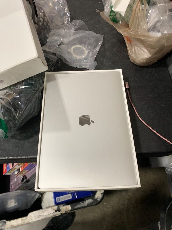 Photo 1 of LOCKED TO PREVIOUS OWNER****SELLING FOR PARTS ONLY-----------------------------*2020 Apple MacBook Air Laptop: Apple M1 Chip, 13” Retina Display, 8GB RAM, 256GB SSD Storage, Backlit Keyboard, FaceTime HD Camera, Touch ID. Works with iPhone/iPad; Silver