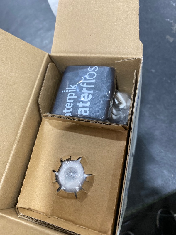 Photo 1 of Waterpik Cordless Advanced 2.0 Water Flosser For Teeth, Gums, Braces, Dental Care With Travel Bag and 4 Tips, ADA Accepted, Rechargeable, Portable, and Waterproof, White WP-580, Packaging May Vary