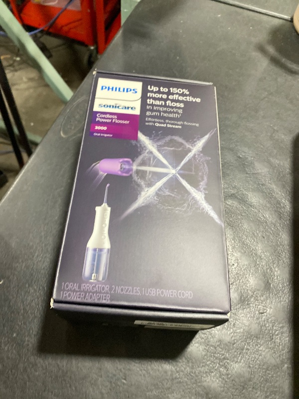 Photo 1 of Philips Sonicare Cordless Power Flosser 3000 - Water Flosser with Innovative Quad Stream Technology, Oral Irrigator with 2 Flossing Modes and 3 Pressure Levels, IPX7 Waterproof, White, HX3826/21