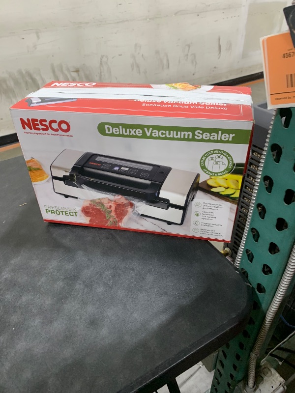 Photo 1 of Vacuum Sealer Machine, 95KPa Commercial Food Saver with Double Seal Strips for 2X Strength, Built-in Cutter & Bag Storage, Easy-Lock Handle, Includes 1 Roll & 10 Pre-cut Bags, Black