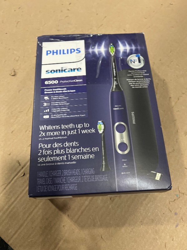 Photo 1 of Philips Sonicare Protective Clean 6500 Rechargeable Electric Toothbrush, with Pressure Sensor, 3 Cleaning Modes, SmarTimer and QuadPacer, 14-Day Battery Life, Charging Travel Case, Purple, HX6462/09