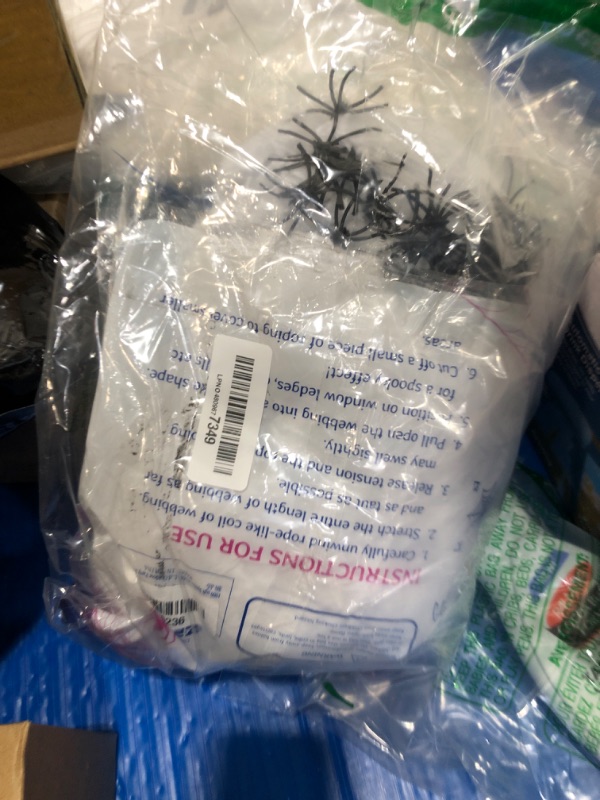 Photo 1 of 1000 sqft Spider Webs Halloween Decorations Bonus with 30 Fake Spiders, Super Stretch Cobwebs for Halloween Indoor and Outdoor Party Supplies