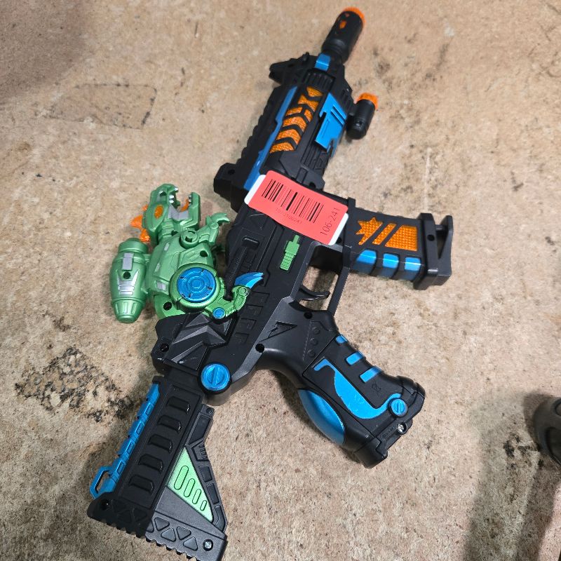 Photo 1 of JOCOUNY Light Up Toy Gun - Retractable Dinosaur & LED Lights & Sound Effect & Barrel Telescopic Actions - Pretend Play Props Toy Machine Guns Toys, Christmas Birthday Gifts for Boys Kids