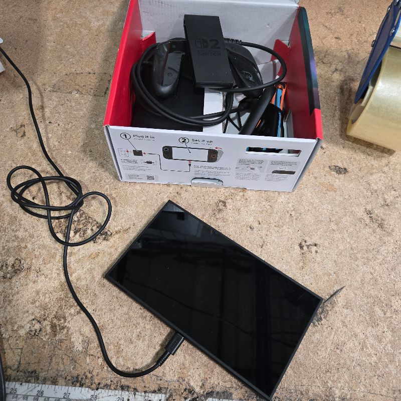Photo 1 of **DOES NOT HOLD A CHARGE OR TURN ON** Nintendo Switch 2 System